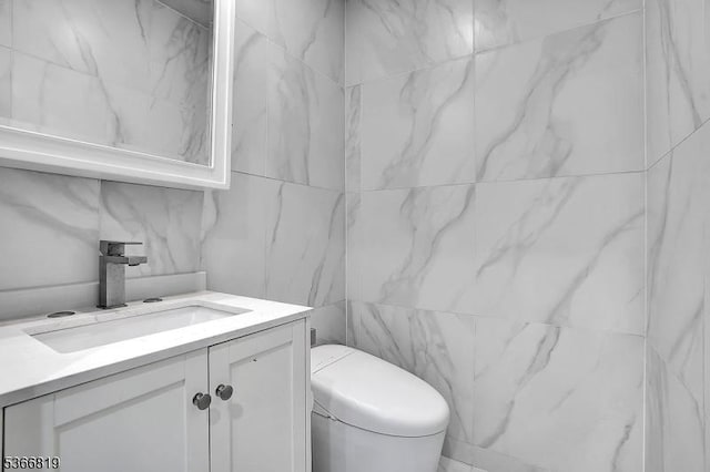 85 Francisco Ave, Little Falls Twp, NJ 07424 - bathroom with vanity and tile walls