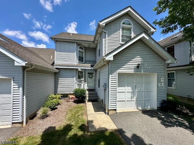 40 Lancelot Dr, Berkeley Heights Twp, NJ 07922 - view of front of house with asphalt driveway and a shingled roof