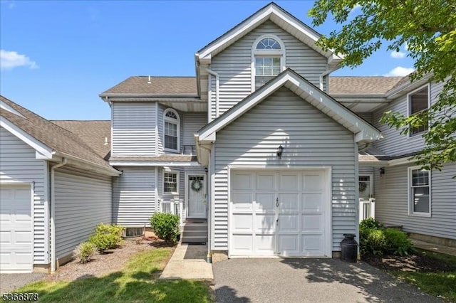 40 Lancelot Dr, Berkeley Heights Twp, NJ 07922 - view of front facade featuring asphalt driveway, an attached garage, and a shingled roof