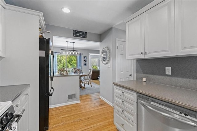 40 Lancelot Dr, Berkeley Heights Twp, NJ 07922 - kitchen featuring dishwasher, freestanding refrigerator, stove, light wood-style flooring, and white cabinets