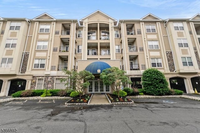 7303 Ravenscroft Rd Unit 7303, Clifton City, NJ 07013 - view of property featuring uncovered parking