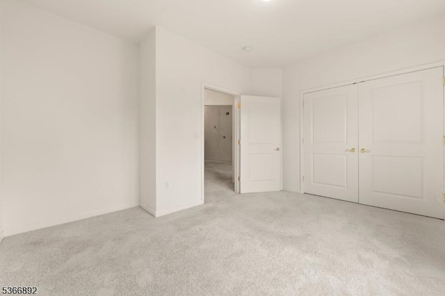 7303 Ravenscroft Rd Unit 7303, Clifton City, NJ 07013 - unfurnished bedroom featuring light colored carpet and a closet