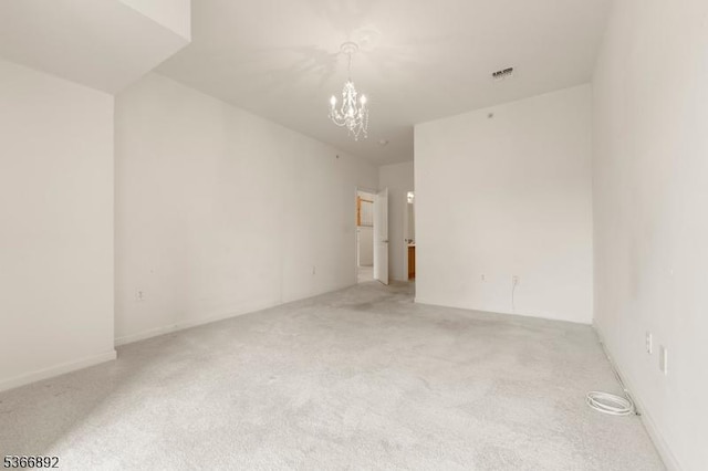 7303 Ravenscroft Rd Unit 7303, Clifton City, NJ 07013 - spare room with a chandelier and light carpet