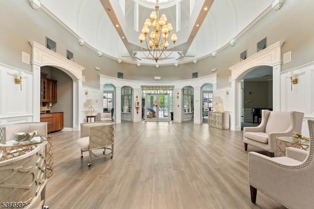 7303 Ravenscroft Rd Unit 7303, Clifton City, NJ 07013 - building lobby featuring a towering ceiling, beam ceiling, and recessed lighting