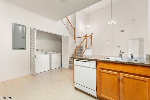 7303 Ravenscroft Rd Unit 7303, Clifton City, NJ 07013 - kitchen featuring dishwasher, electric panel, a towering ceiling, a chandelier, and brown cabinetry