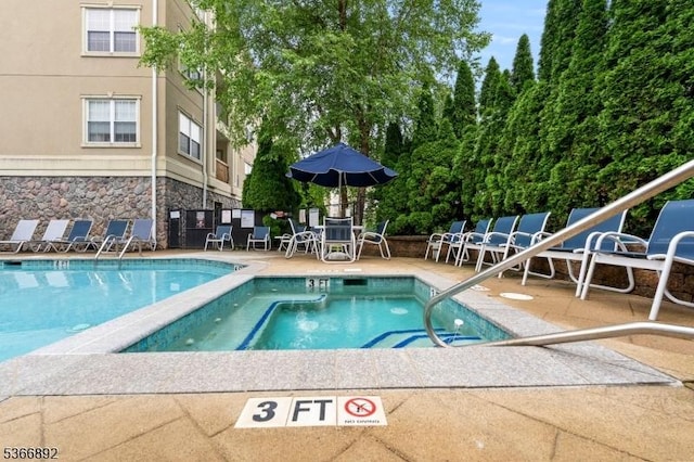 7303 Ravenscroft Rd Unit 7303, Clifton City, NJ 07013 - community pool featuring a patio