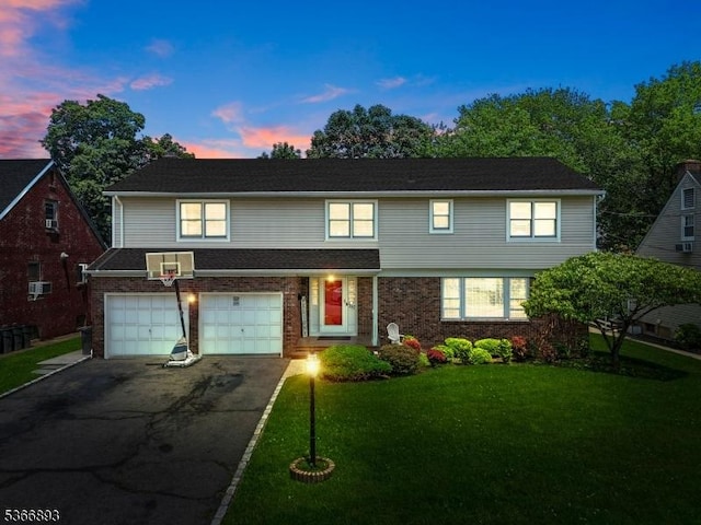 357 Minute Arms Rd, Union Twp, NJ 07083 - view of front of property featuring asphalt driveway, a garage, a lawn, and brick siding