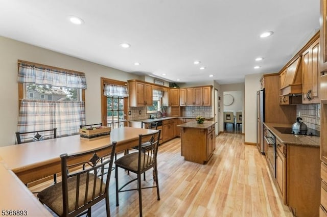357 Minute Arms Rd, Union Twp, NJ 07083 - kitchen with custom exhaust hood, black electric stovetop, a center island, recessed lighting, and tasteful backsplash