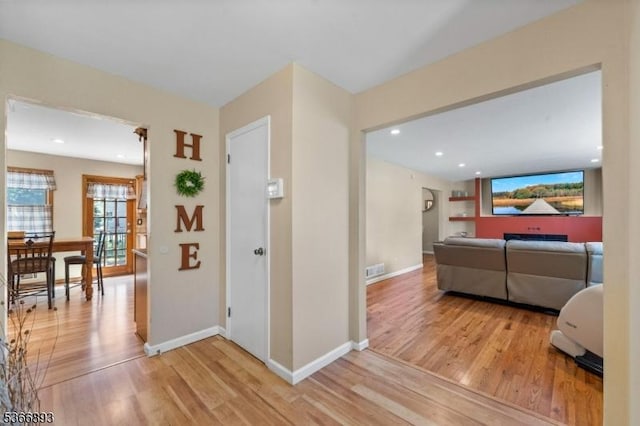357 Minute Arms Rd, Union Twp, NJ 07083 - corridor with light wood-style flooring and baseboards