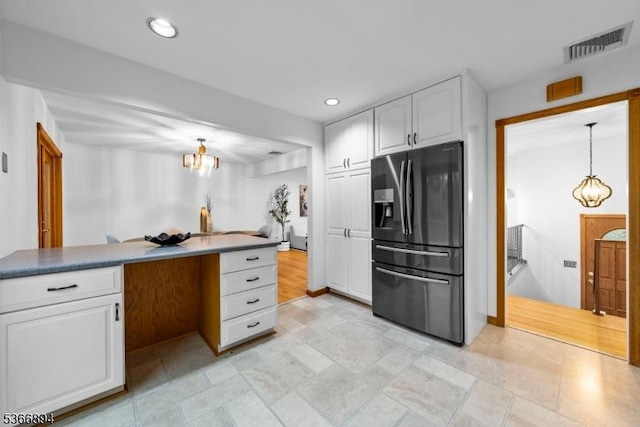 11 Hillcrest Blvd, Warren Twp, NJ 07059 - kitchen with stainless steel fridge with ice dispenser, white cabinets, a chandelier, recessed lighting, and decorative light fixtures