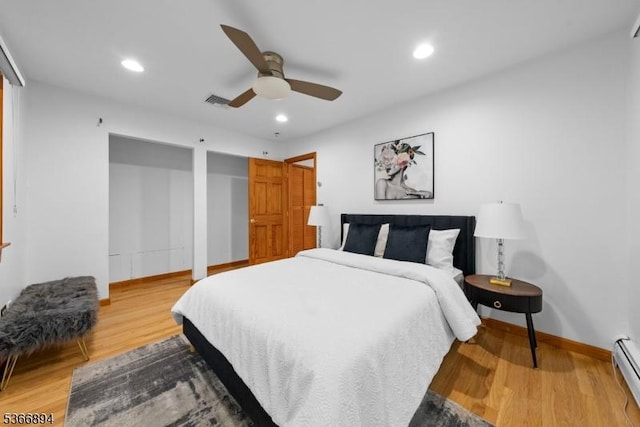 11 Hillcrest Blvd, Warren Twp, NJ 07059 - bedroom featuring wood finished floors, recessed lighting, a baseboard heating unit, and a ceiling fan