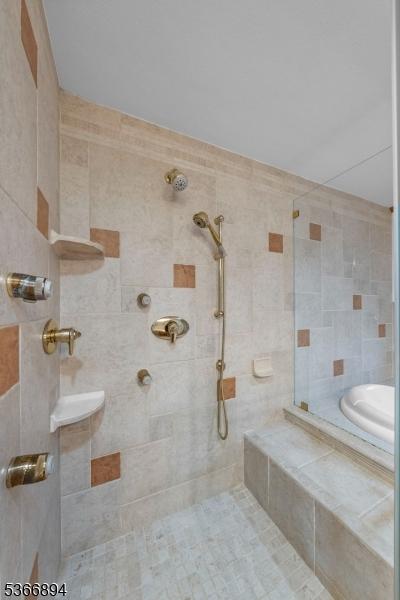 11 Hillcrest Blvd, Warren Twp, NJ 07059 - bathroom featuring tiled shower and tiled bath