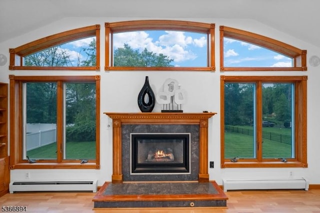 11 Hillcrest Blvd, Warren Twp, NJ 07059 - detailed view of a baseboard radiator, wood finished floors, and a fireplace