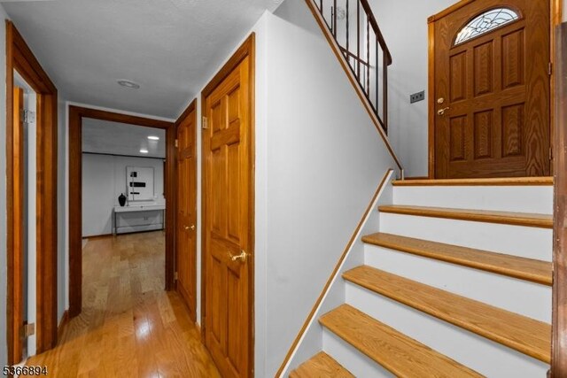 11 Hillcrest Blvd, Warren Twp, NJ 07059 - stairway with hardwood / wood-style flooring and recessed lighting