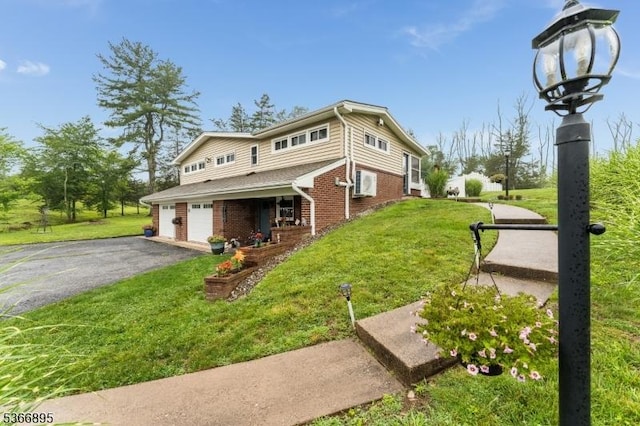 417 Mountain Rd, Readington Twp, NJ 08833 - view of home's exterior featuring brick siding, a lawn, an attached garage, and asphalt driveway