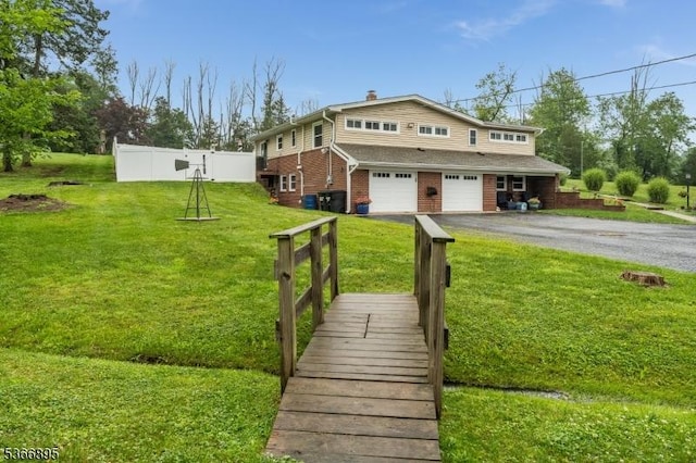 417 Mountain Rd, Readington Twp, NJ 08833 - back of property featuring driveway, an attached garage, brick siding, and a chimney
