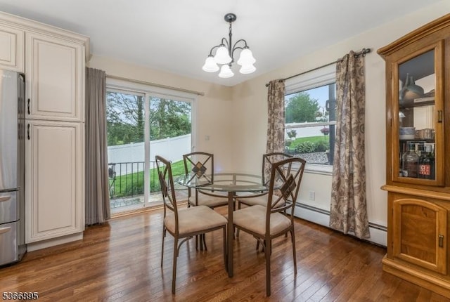 417 Mountain Rd, Readington Twp, NJ 08833 - dining space with a chandelier, dark wood-style flooring, plenty of natural light, and a baseboard heating unit