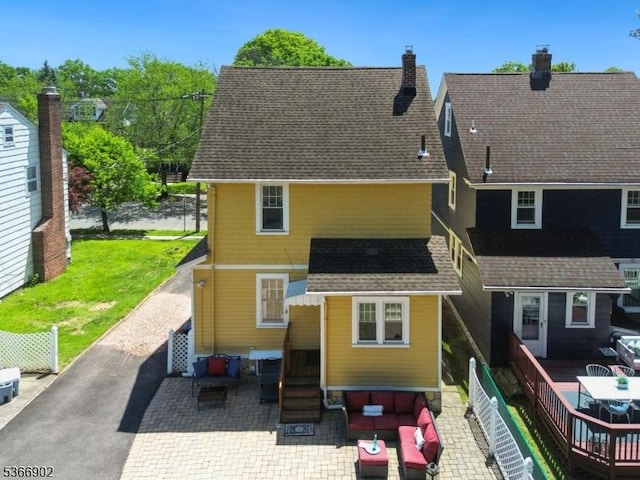 227 Parker Ave, Maplewood Twp, NJ 07040 - rear view of property with entry steps, a patio area, a chimney, and outdoor lounge area