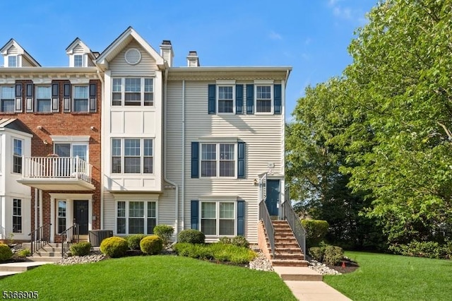 4106 Dilts Ln, Bridgewater Twp, NJ 08807 - view of front facade featuring a front yard and a chimney