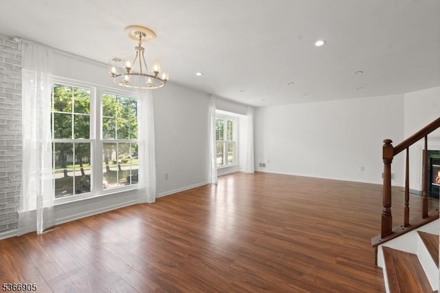 4106 Dilts Ln, Bridgewater Twp, NJ 08807 - unfurnished room featuring stairway, a chandelier, wood finished floors, and recessed lighting
