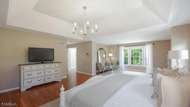 24 Montfort Dr, Montgomery Twp, NJ 08502 - bedroom featuring wood finished floors, a chandelier, and a tray ceiling