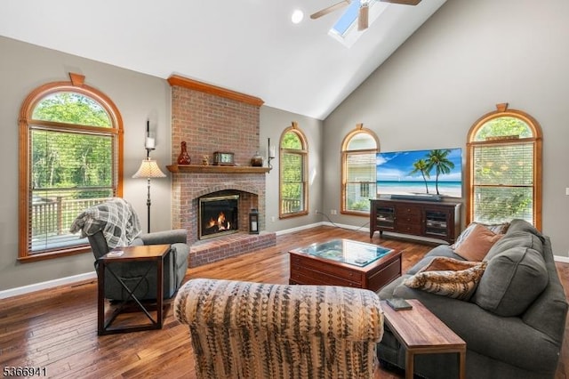 21 Partridge Rd, Readington Twp, NJ 08822 - living room featuring ceiling fan, healthy amount of natural light, wood finished floors, a fireplace, and high vaulted ceiling