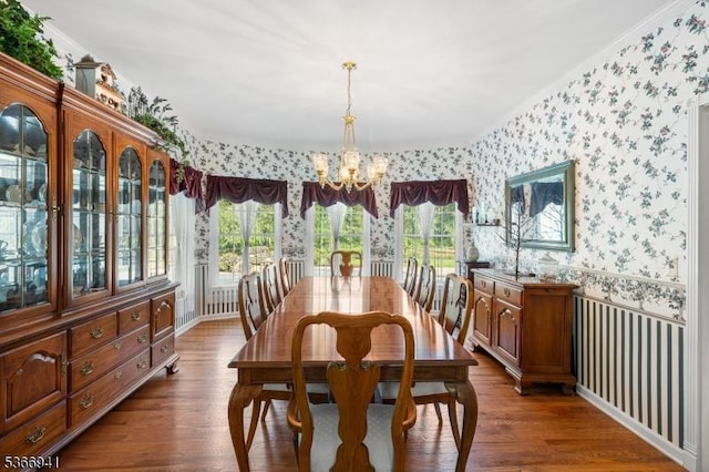 21 Partridge Rd, Readington Twp, NJ 08822 - dining space with wallpapered walls, a chandelier, plenty of natural light, ornamental molding, and wood finished floors