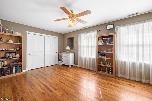 21 Partridge Rd, Readington Twp, NJ 08822 - unfurnished bedroom with wood finished floors, a closet, and a ceiling fan