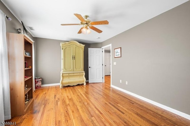 21 Partridge Rd, Readington Twp, NJ 08822 - unfurnished bedroom with light wood-style flooring and a ceiling fan