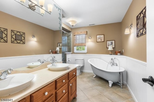 21 Partridge Rd, Readington Twp, NJ 08822 - full bath with a wainscoted wall, a soaking tub, a tile shower, tile patterned floors, and double vanity