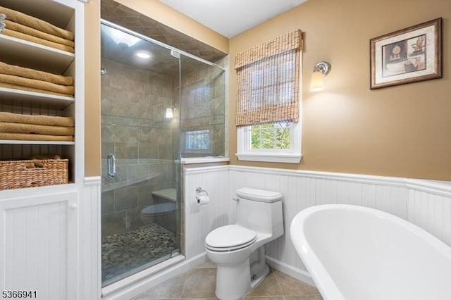 21 Partridge Rd, Readington Twp, NJ 08822 - full bath featuring a soaking tub, a wainscoted wall, a shower stall, and tile patterned floors