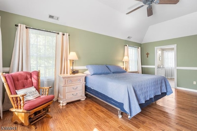 21 Partridge Rd, Readington Twp, NJ 08822 - bedroom featuring multiple windows, vaulted ceiling, wood finished floors, ceiling fan, and connected bathroom