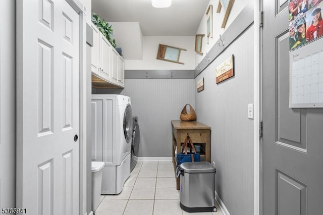 21 Partridge Rd, Readington Twp, NJ 08822 - laundry area featuring light tile patterned floors, cabinet space, and independent washer and dryer