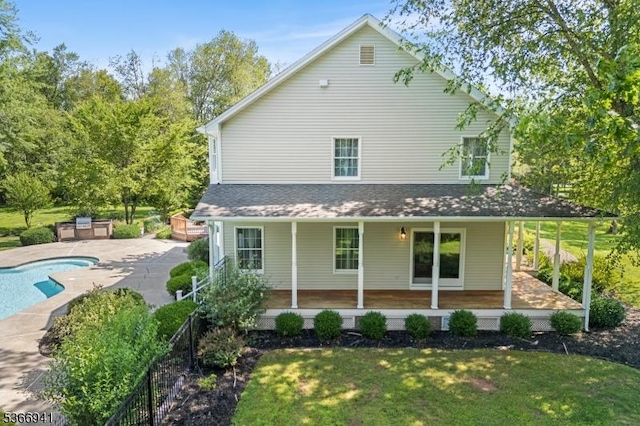 21 Partridge Rd, Readington Twp, NJ 08822 - rear view of property featuring an outdoor pool, a yard, and covered porch