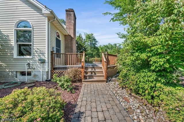 21 Partridge Rd, Readington Twp, NJ 08822 - view of side of home featuring a chimney and a wooden deck