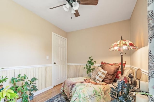 28 Old Beaver Run Rd, Lafayette Twp, NJ 07848 - bedroom featuring wood finished floors, ceiling fan, and wainscoting