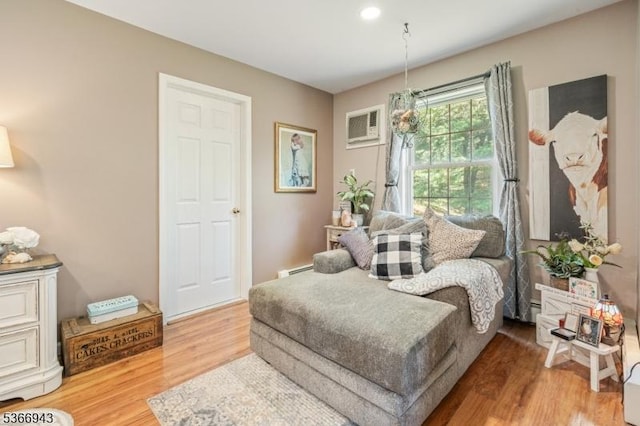 28 Old Beaver Run Rd, Lafayette Twp, NJ 07848 - living area featuring wood finished floors, a wall mounted AC, a baseboard heating unit, and recessed lighting