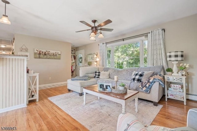 28 Old Beaver Run Rd, Lafayette Twp, NJ 07848 - living area with a ceiling fan, light wood finished floors, and a baseboard heating unit