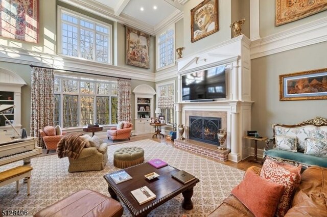 141 Mountaintop Rd, Bernardsville Boro, NJ 07924 - living area with a high ceiling, a fireplace, beam ceiling, coffered ceiling, and crown molding
