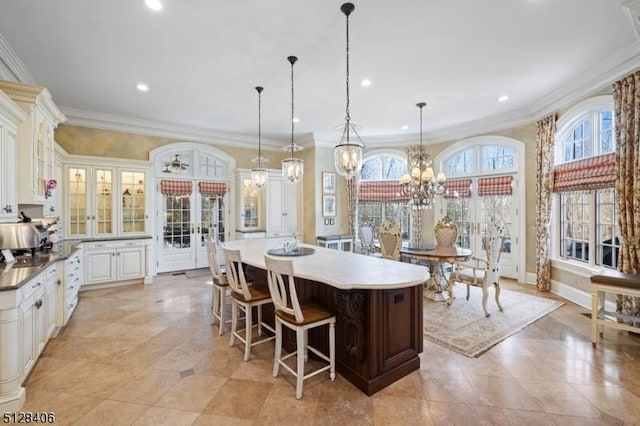 141 Mountaintop Rd, Bernardsville Boro, NJ 07924 - kitchen featuring a chandelier, glass insert cabinets, recessed lighting, a kitchen island, and crown molding