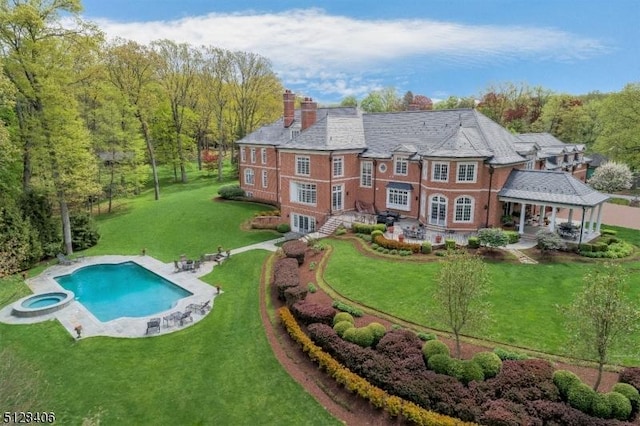 141 Mountaintop Rd, Bernardsville Boro, NJ 07924 - back of property with a gazebo, a lawn, a chimney, and a pool with connected hot tub
