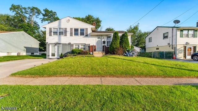 32 Washington Ave, Edgewater Park Twp, NJ 08010 - split level home with a chimney and french doors
