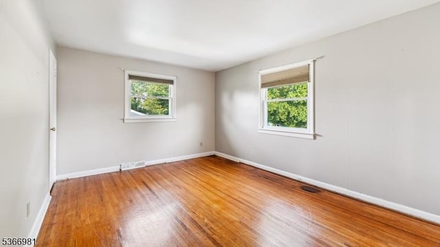 32 Washington Ave, Edgewater Park Twp, NJ 08010 - unfurnished room with plenty of natural light and wood finished floors