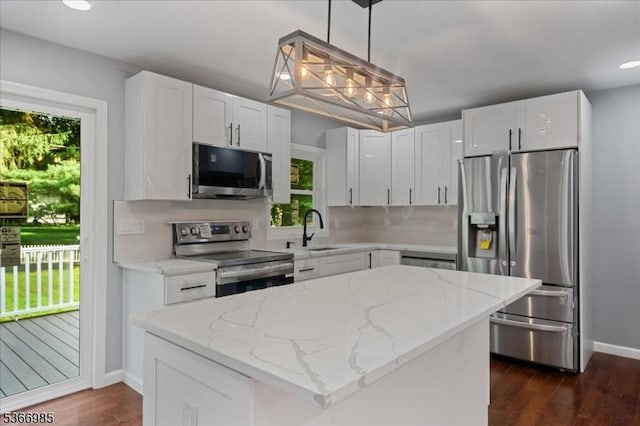 204 Christopher St, Hackettstown Town, NJ 07840 - kitchen with stainless steel appliances, healthy amount of natural light, dark wood-style flooring, backsplash, and recessed lighting