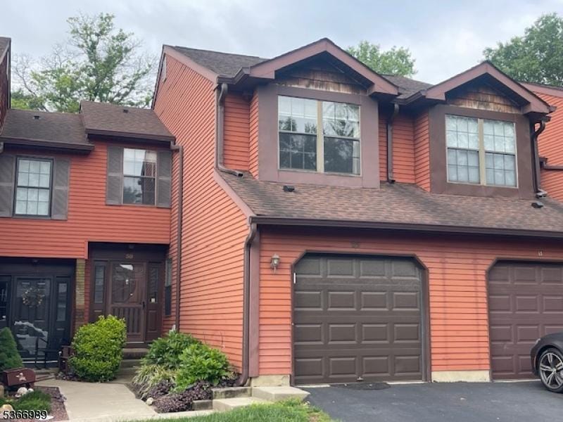 59 Bayberry Dr, Franklin Twp, NJ 08873 - townhome / multi-family property featuring a garage, driveway, and a shingled roof