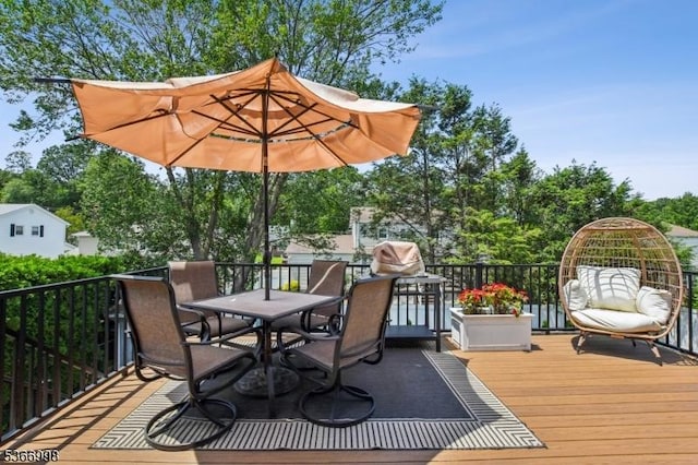 23 Midway Ct, Rockaway Twp, NJ 07866 - deck with outdoor dining space and view of wooded area