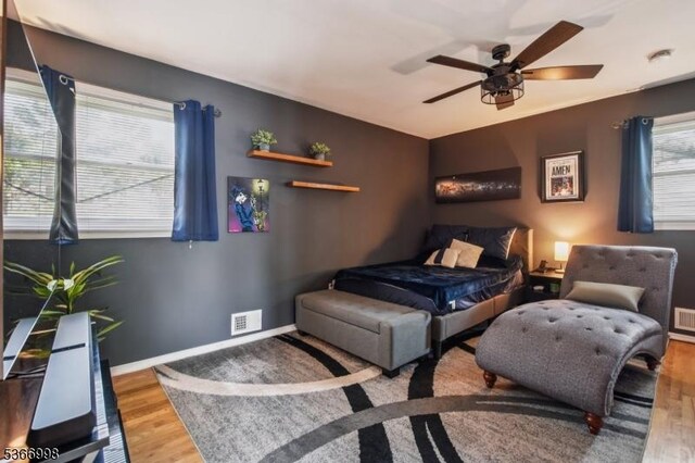 23 Midway Ct, Rockaway Twp, NJ 07866 - bedroom with wood finished floors and ceiling fan