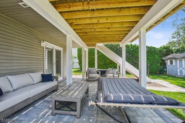 23 Midway Ct, Rockaway Twp, NJ 07866 - view of patio / terrace featuring an outdoor hangout area and a storage unit