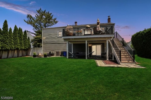 23 Midway Ct, Rockaway Twp, NJ 07866 - back of house with stairs, a wooden deck, and a chimney