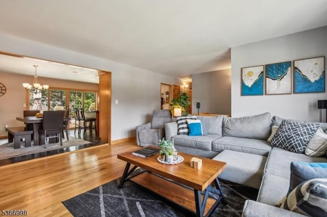 23 Midway Ct, Rockaway Twp, NJ 07866 - living room featuring a chandelier and wood finished floors